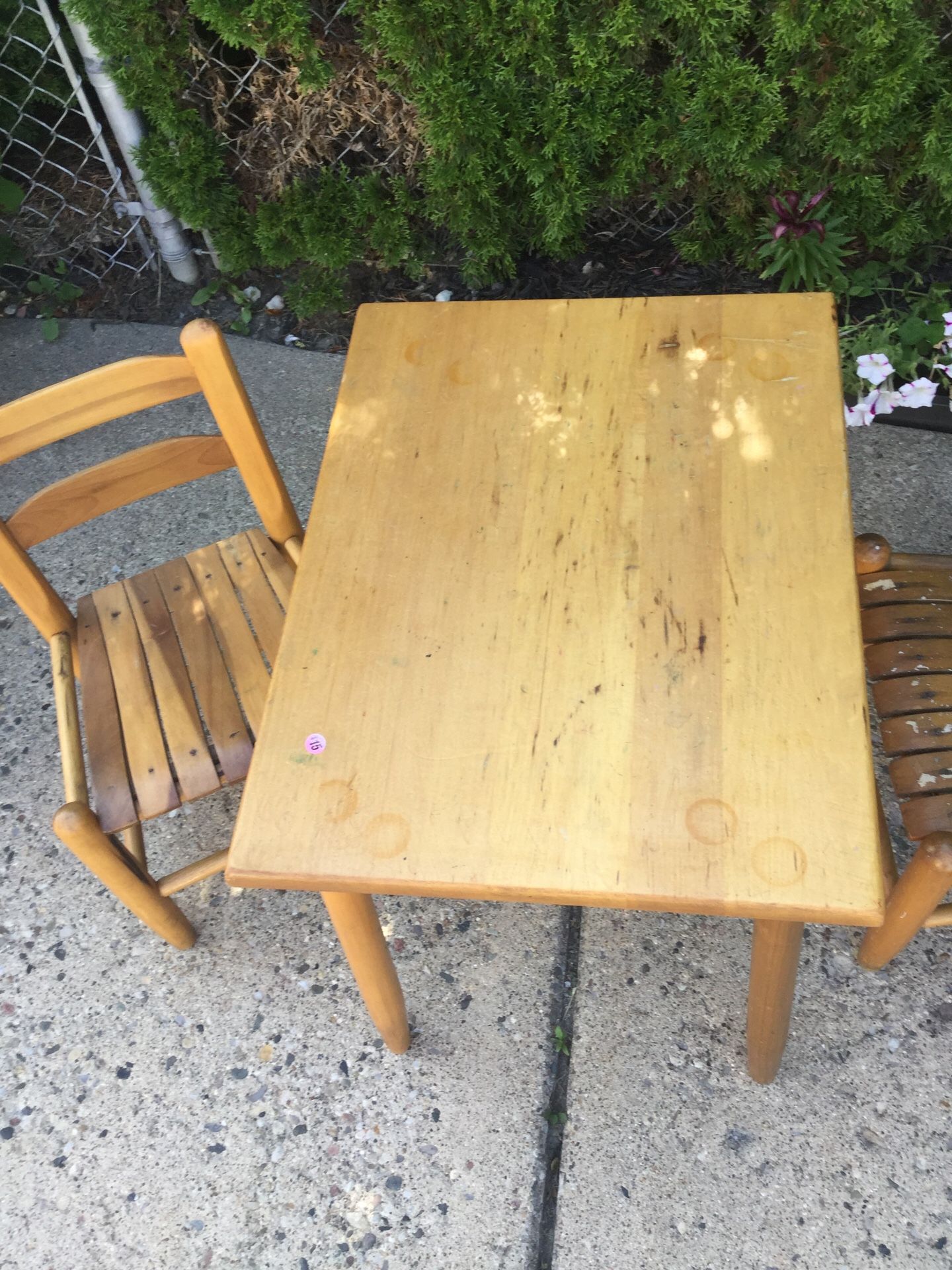 Small kids play table and two wooden chairs