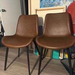 Two Faux Leather Chairs 