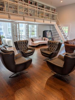 Pottery Barn 'Wells Tufted Leather Swivel Chairs'