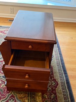 Side table with drawers and magazine rack