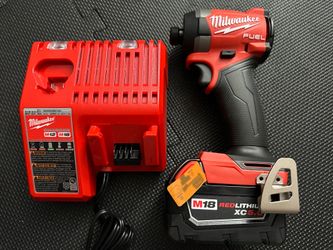 New Milwaukee M18 2953-20 1/4 impact driver with 5Ah battery