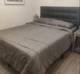 Queen size Black Upholstered Headboard with Bed Frame - $90 (North Bethesda)