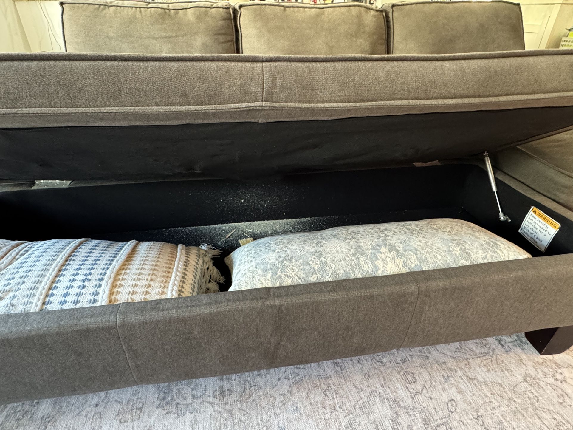 Grey Sectional With Storage Ottoman