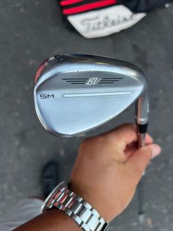 Titleist Vokey SM9 54° 14F wedge.
