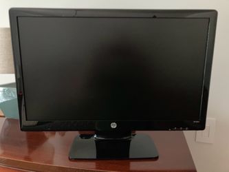 Two HP computer monitors