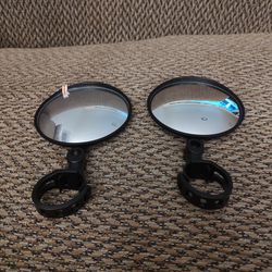 MOTORCYCLE/BIKE MIRRORS.  4" MIRROR.  MIRROR MOVES FRONT TO BACK AND SIDE TO SIDE.  $6 EACH. 2 FOR $10. NEW. PICKUP ONLY