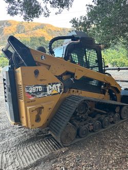 Skid steer land clearing wood chipper
