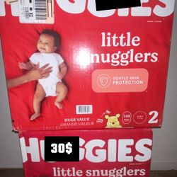 Huggies diapers size 1 and 2  , 2 boxes