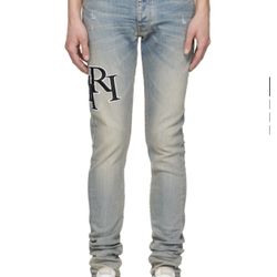 Amiri Staggered Jean Size 34