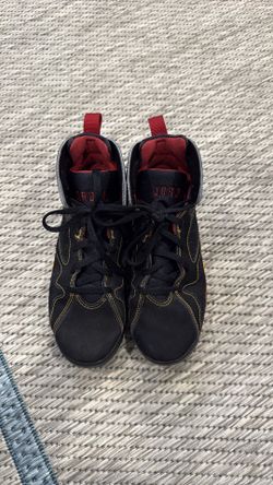 Black high top Jordan shoes