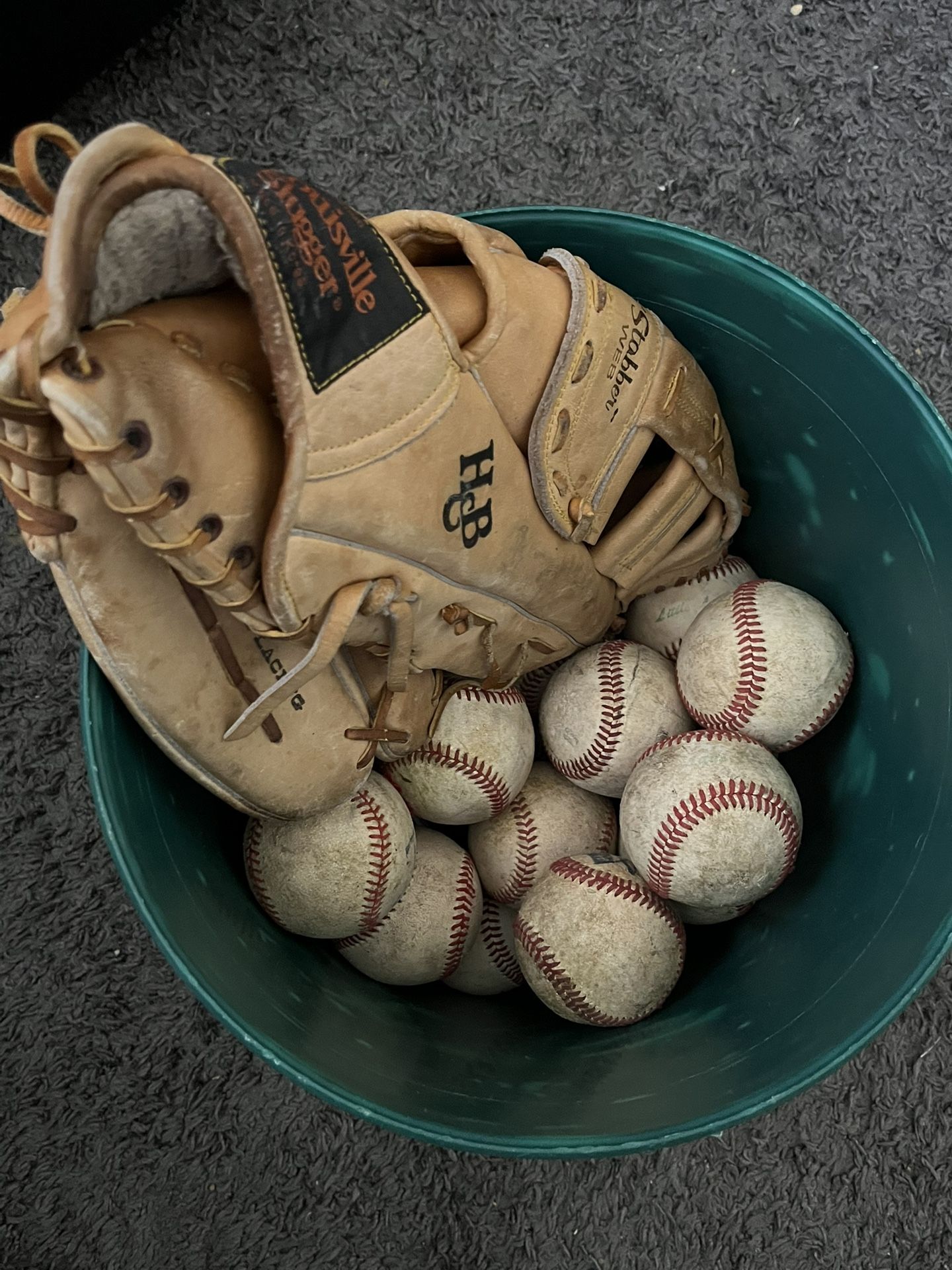 40 Baseballs & 1 Louisville Slugger Baseball Glove.