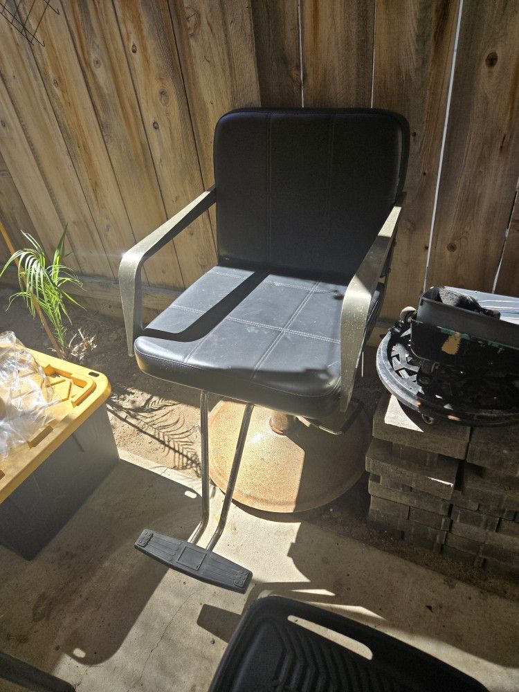 Kayak, Barber Chair. Elliptical Machine And The 2 Small Fishing Rod.