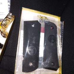 Nickel And Gold Part For A 45 911 Pistol