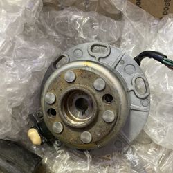 Stater And Fly Wheel For A 2000 Yz125