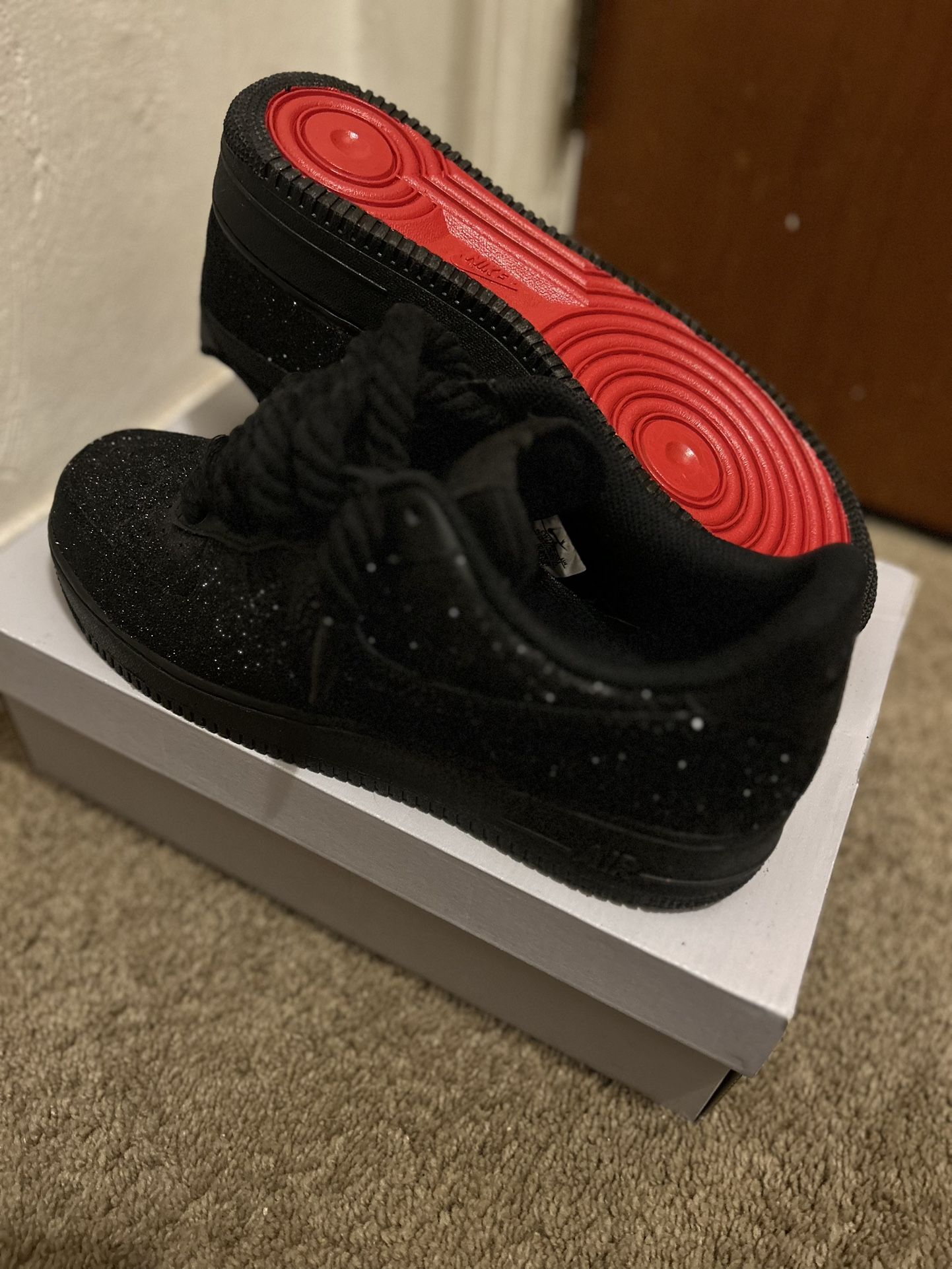 Black glitter top red bottoms