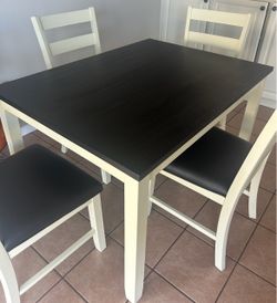Table with 4 chairs for sale