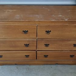 Wooden Deessor with 6 Drawers. All Drawers Work And Not Broken..