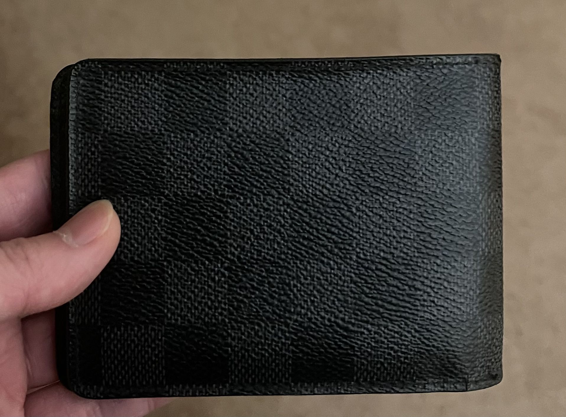 👹👹Sold👹👹 Louis Vuitton multiple wallet.