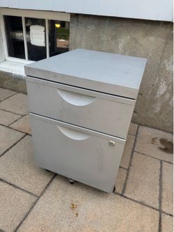 Small metal filing cabinet