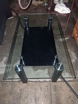Glass coffee table , almost new , how do you ever use your adventure