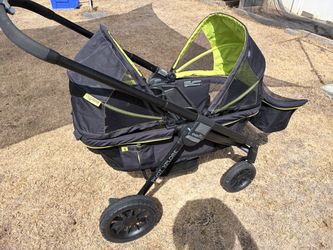 Evenflo Pivot Xplore Stroller Wagon with storage basket– Black & Green – Great Condition