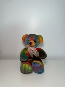Rainbow teddy bear with bow