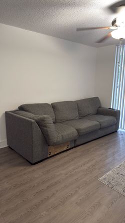 Kevin Charles grey cloth sofa