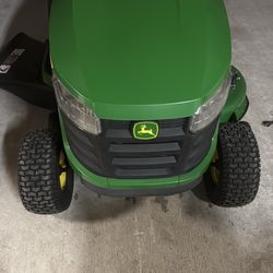 John Deere S100 tractor mower