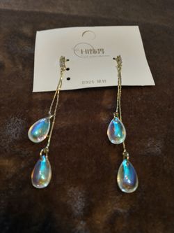 These are iridescent teardrop chandelier earrings