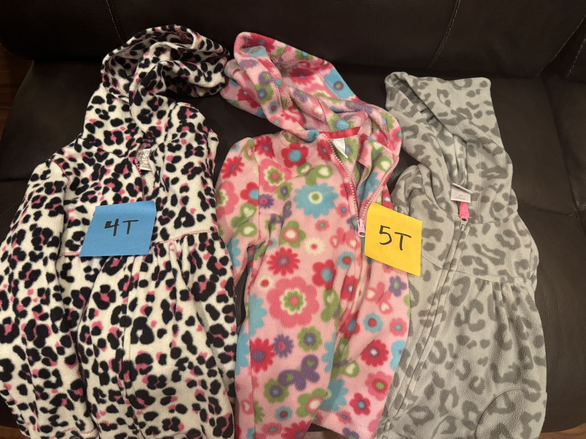 GUC size 4 animal print black pink jacket, size 5 pink flowers jacket, size 5 gray animal print jacket Size 6 orange jacket Size 6-8 black hoodie ja