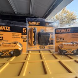 Three Dewalt Batteries Plus Charger