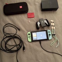Nintendo Switch (Animal Crossing Edition)Palm coast YES AVAILABLE 