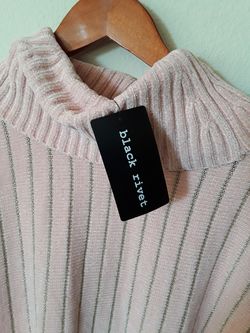 PONCHO. NEW WITH TAGS