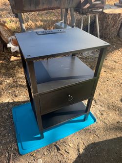 Black nightstand with power