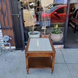 Vintage table with stone top