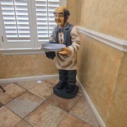 figure of waiter with tray 