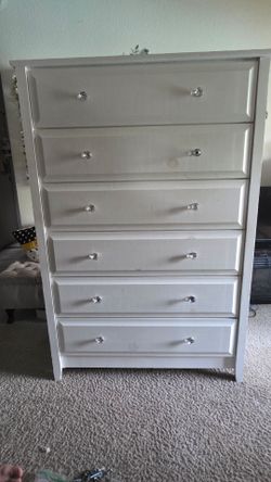 White dresser with crystal knobs