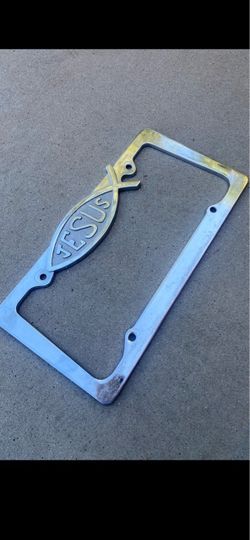 CHROME LICENSE PLATE FRAME (JESUS). Fish LOGO