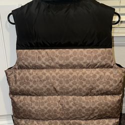 Coach monogram puffer vest.