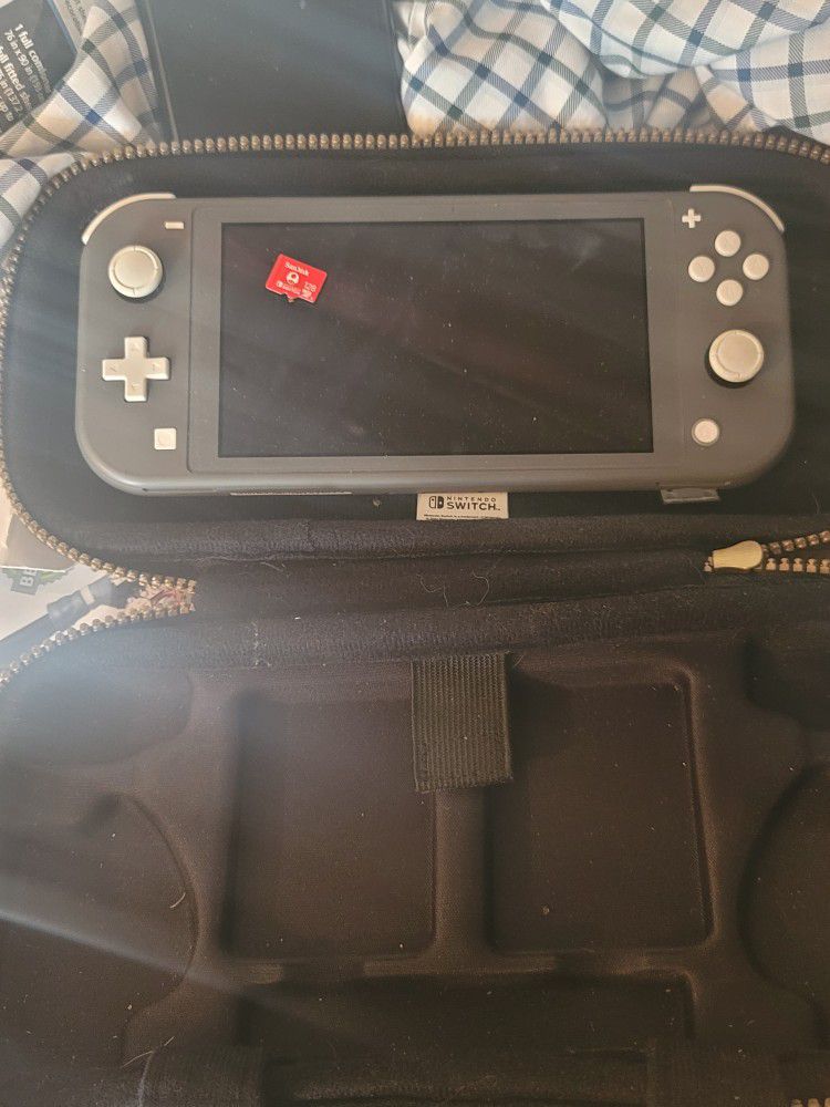 Nintendo Switch Lite. Case, 128gb Nintendo Micro SD HIGH Speed. Breath of Wild and Links Awakening On Board