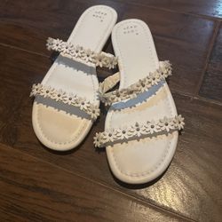 White sandals with flower straps size 8 1/2