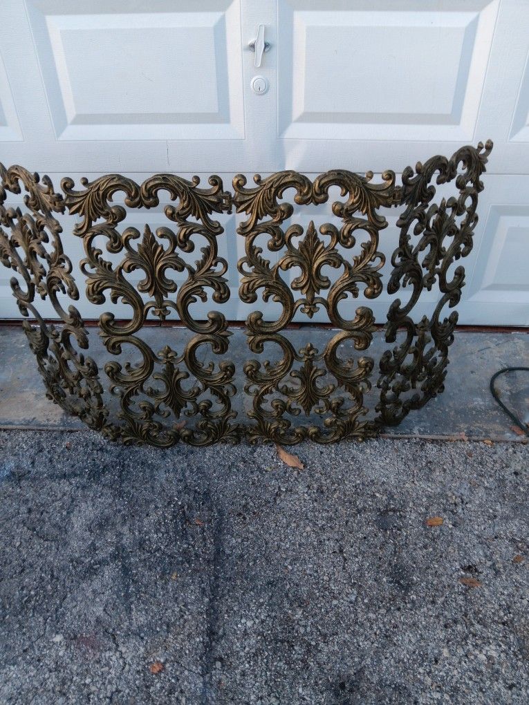 Vintage Scrolled Fireplace
Brass colored, but Cast Alumi