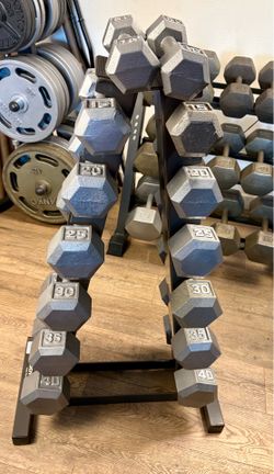 Hex Cast Iron Dumbbells in NEW Condition pairs from 10s to 40s. Total: 350 lbs [NO RACK INCLUDED]