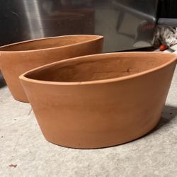 Pair Of Unique Shaped Planters $45