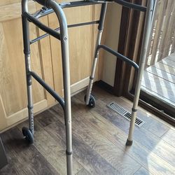 Lumex Two Button Folding Walker with Wheels
