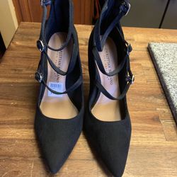 The women’s like new black stiletto heels ankle strap