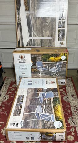 New My Texas House Cambria Collection outdoor dining set. This set includes one rectangle dining table, two swivel rocker dining chairs, and two stati
