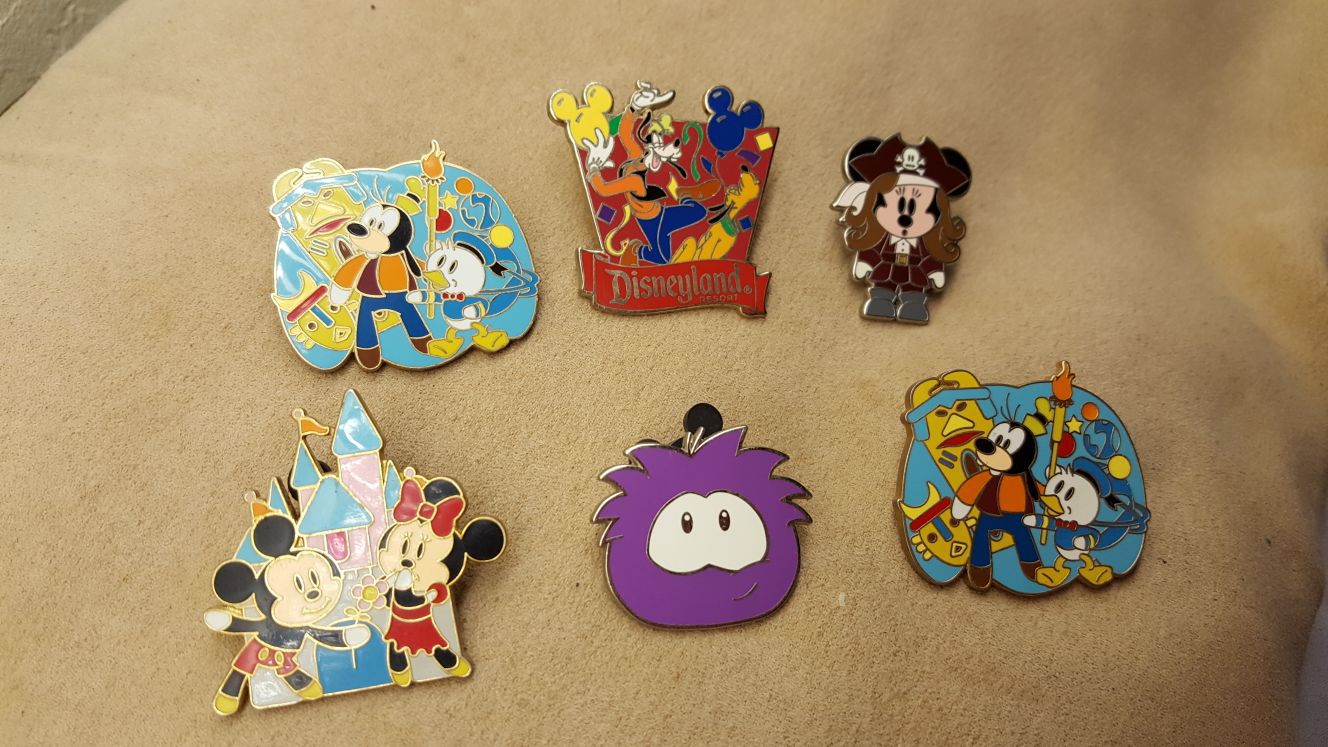 Disney trading pins 8.00 each pick up on ashlan and peach