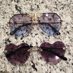 2 Pairs Of Sunglasses