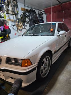 M3 97 4 DOOR AUTO 91000 MILES